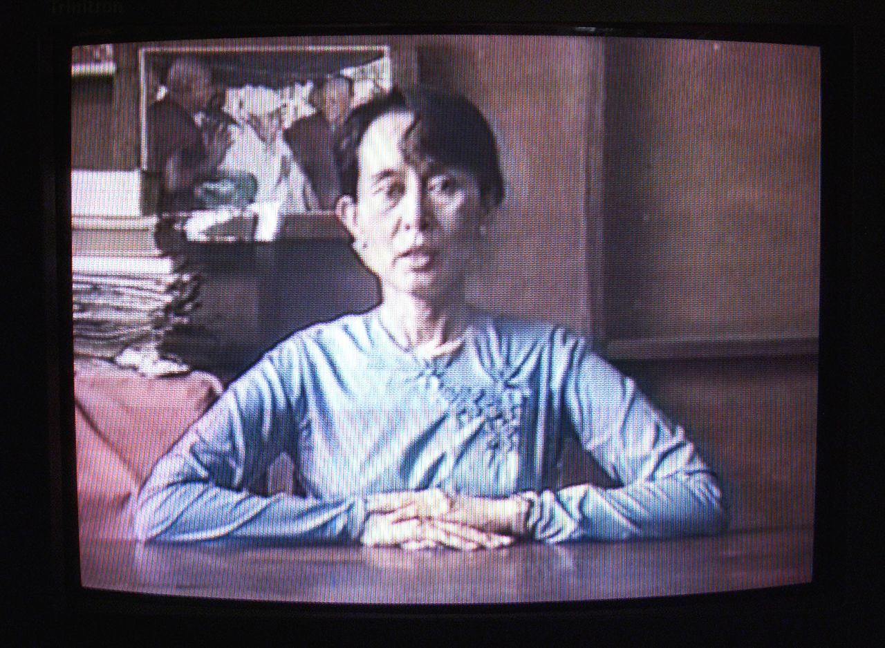 Suu Kyi, in a 1999 home video, gives her support to economic sanctions against her country as a means to affect the governing military.