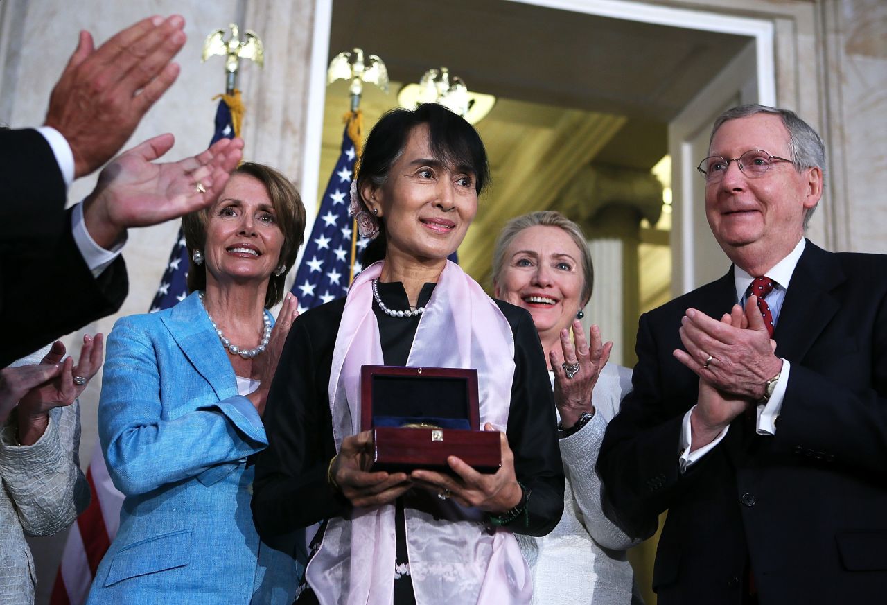 Suu Kyi is presented with the Congressional Gold Medal while visiting the US Capitol in 2012.