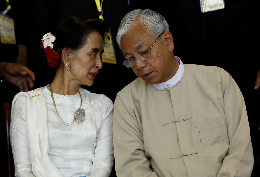 Suu Kyi and President Kyaw talk at a conference in Naypyidaw in 2016.