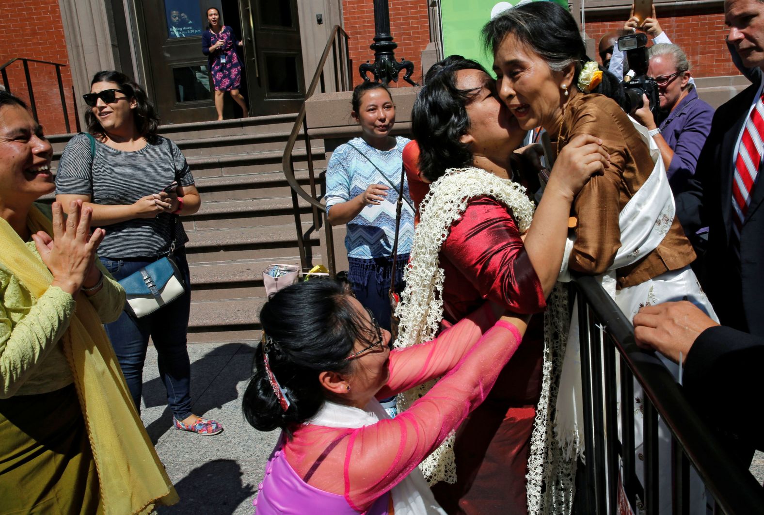 Supporters rush to greet Suu Kyi in Washington, DC, after she met with US Secretary of State John Kerry in 2016.