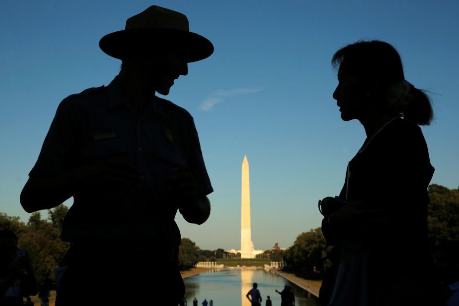 Suu Kyi is guided by National Park Service Ranger Heath Mitchell on her visit to Washington, DC, in 2016.