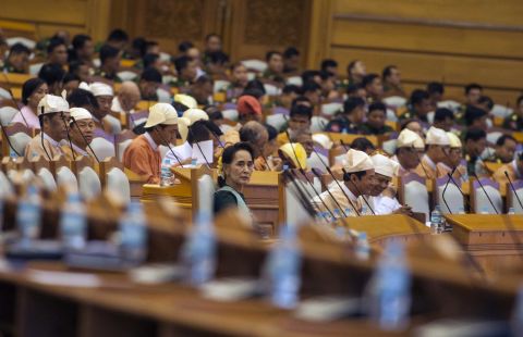 Suu Kyi and members of parliament take their positions during the presidential vote in Naypyidaw, Myanmar, in 2016. Htin Kyaw, Suu Kyi's longtime aide, was voted as president.