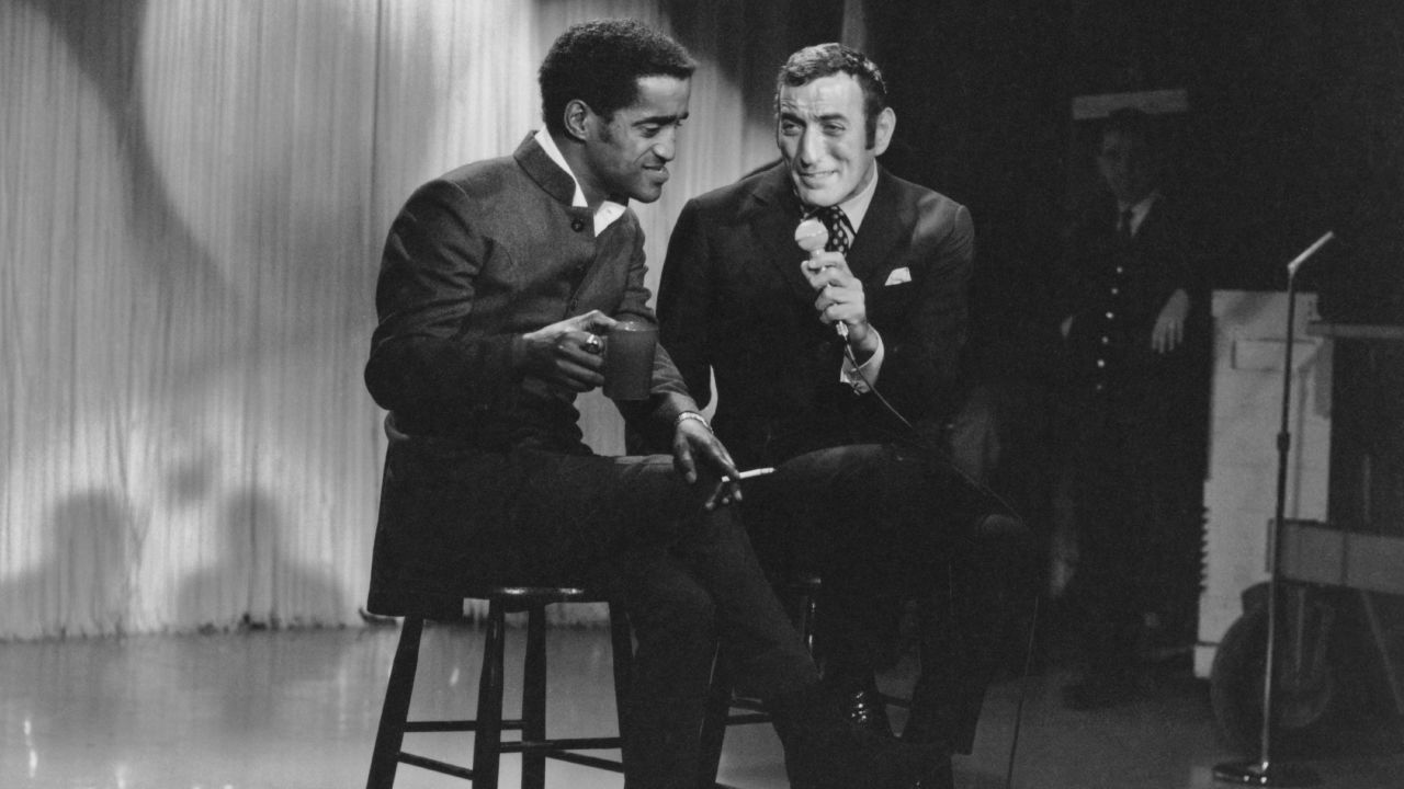 American singers Sammy Davis Jr. and Tony Bennett perform on TV around 1960.