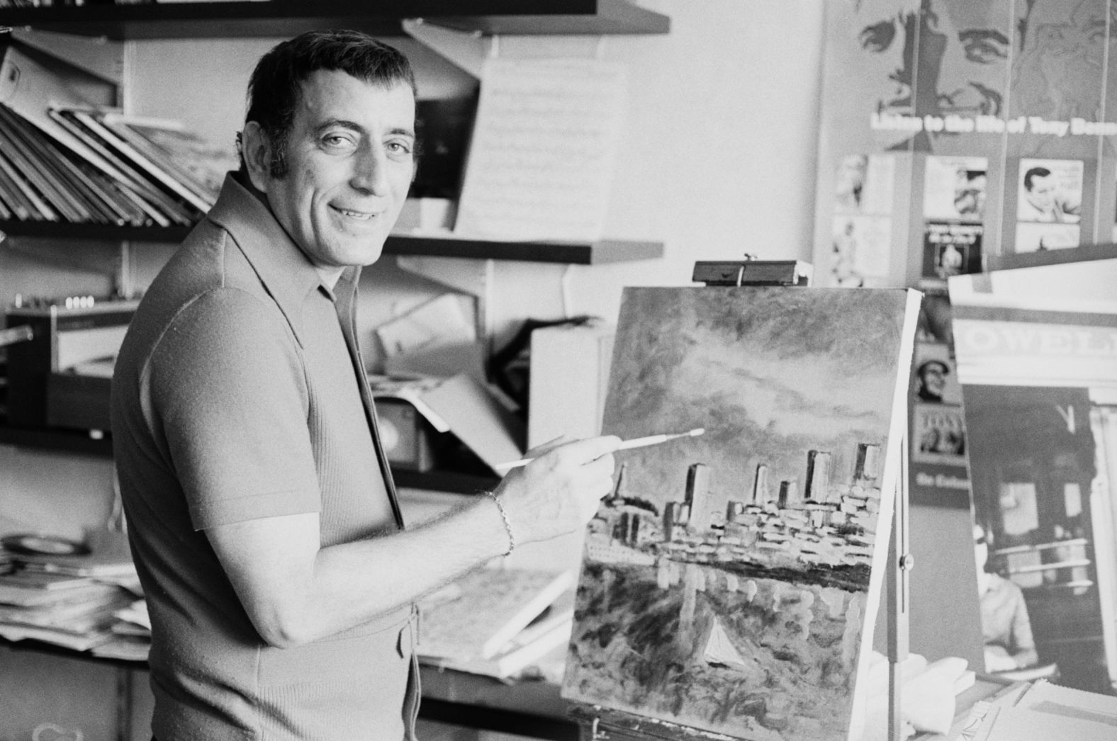 Bennett paints a city landscape in 1971.