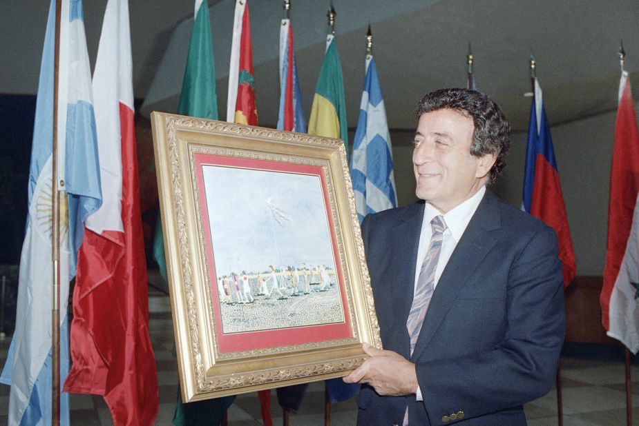 Bennett displays his watercolor painting "Peace," which he donated to the United Nations in 1987. After his popularity waned in the 1970s, Bennett re-signed with Columbia Records in 1986 and began to revitalize his career. Throughout the 1980s and early 1990s, he found a new audience of young people and appeared on shows such as "Late Night with David Letterman" and "The Simpsons."