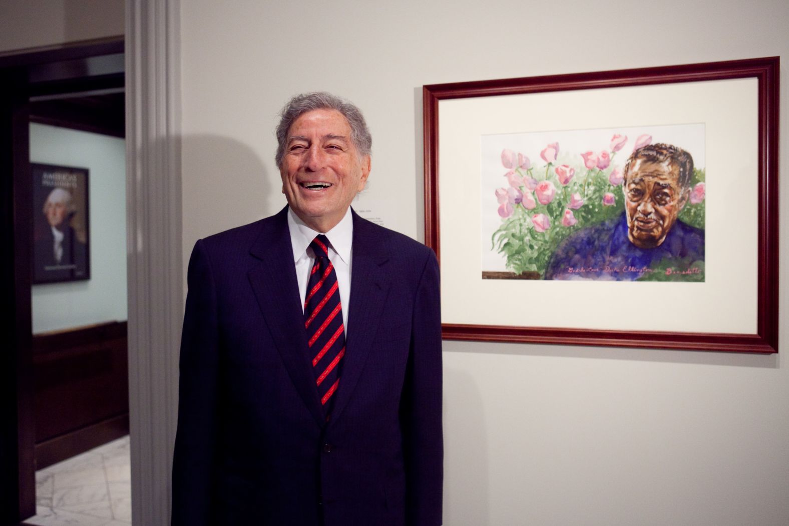 Bennett speaks to reporters after presenting his painting of jazz musician Duke Ellington to the Smithsonian National Portrait Gallery in 2009.