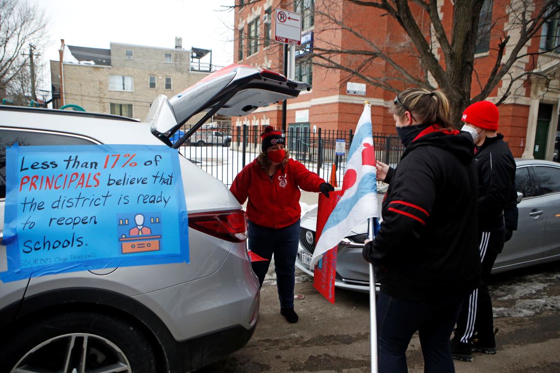 Supporters of the Chicago Teachers Union prepare for a car caravan on January 30.