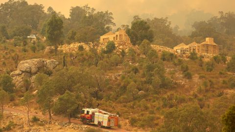 Firefighters drive toward a property off Copley Road in Upper Swan as bushfires close in on the area on February 2, 2021 in Perth, Australia. 