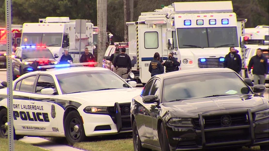 Law enforcement gather at the scene of a shooting in Sunrise, Florida, on Tuesday, February 2.
