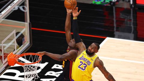 James defends a pass intended for Clint Capela of the Atlanta Hawks.