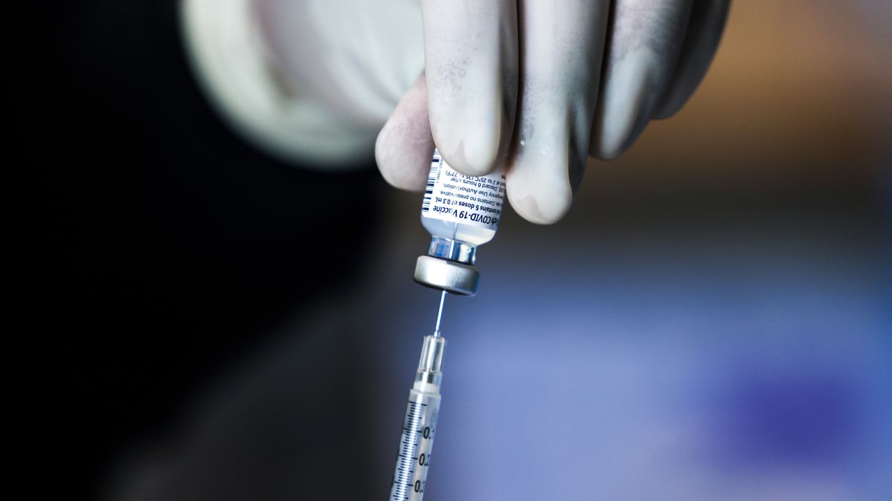 DENVER, CO - JANUARY 30: Pharmacy technicians prepare doses of the Pfizer-BioNTech vaccine at a mass COVID-19 vaccination event on January 30, 2021 in Denver, Colorado. UCHealth, Colorado's largest healthcare provider, plans to vaccinate 10,000 seniors over 70 during the drive-up event this weekend. (Photo by Michael Ciaglo/Getty Images)