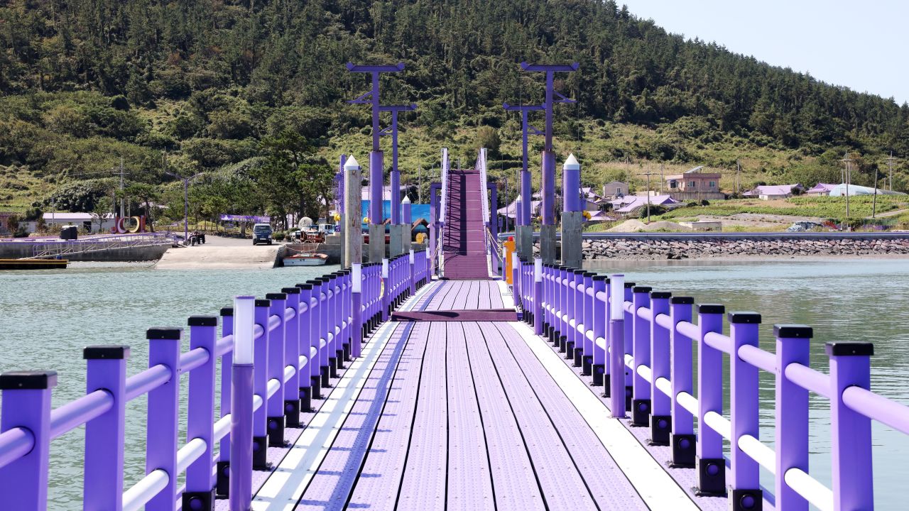 The purple bridge was fixed up and repainted in early 2020.