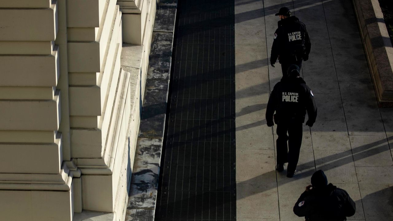 Capitol Police officers sweep the grounds of the U.S. Capitol building on January 7, 2021 in Washington, DC.
