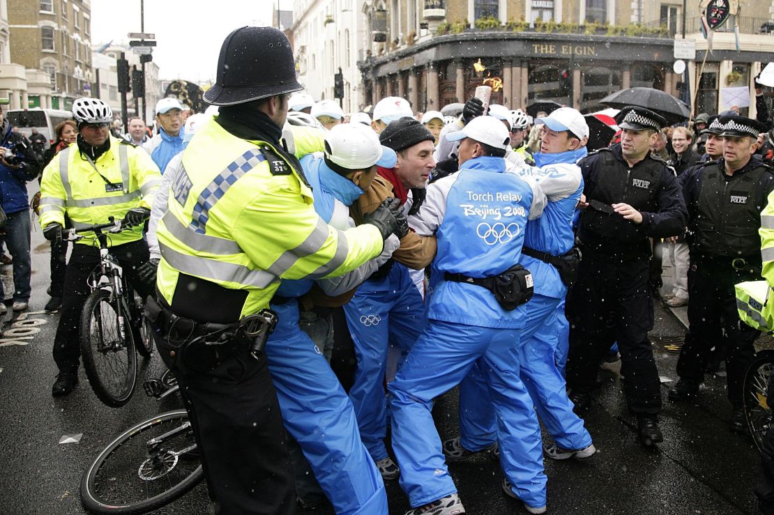 Protesters clash with police and Olympic security as the Torch Relay passes through London on April 6, 2008.