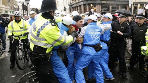 Protesters clash with police and Olympic security as the Torch Relay passes through London on April 6, 2008.