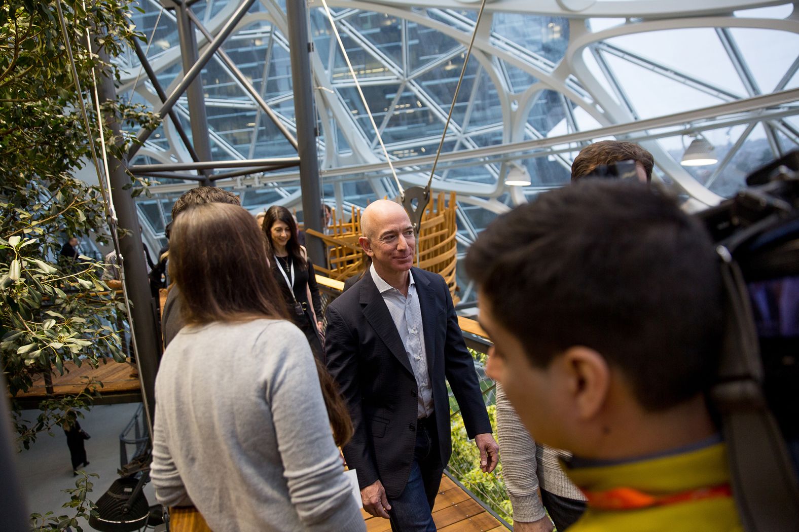 Bezos tours the Spheres, a gathering and working space for Amazon employees, at its opening ceremonies in Seattle in 2018. The space contains hundreds of plant species from cloud forest environments around the globe, and it maintains a tropical climate similar to Costa Rica or Indonesia. 