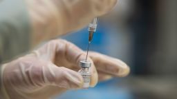 PORTLAND, OR - DECEMBER 16: A healthcare worker prepares COVID-19 vaccine doses at the Portland Veterans Affairs Medical Center on December 16, 2020 in Portland, Oregon. The first rounds of Pfizer's vaccine were administered in Oregon on Wednesday.  (Photo by Nathan Howard/Getty Images)