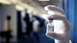 A health worker holds a vial of Pfizer-BioNTech vaccine against the coronavirus at a vaccination centre set up at the Dubai International Financial Center in the Gulf emirate of Dubai, on February 3, 2021. - The United Arab Emirates, which includes Dubai and six other emirates, has suffered a spike in cases after the holiday period.
It was among the first to launch a vast vaccination campaign in December 2020 for its population of nearly 10 million and has administered at least three million doses to more than a quarter of its population, second only to Israel in the global race, according to the German data agency Statista. (Photo by Karim SAHIB / AFP) (Photo by KARIM SAHIB/AFP via Getty Images)