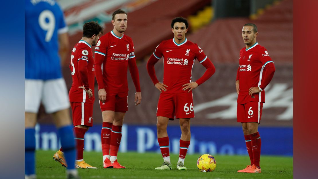 Liverpool players looked dejected after Brighton's Steven Alzate scored on Wednesday. 