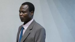 Dominic Ongwen, a senior commander in Uganda's Lord's Resistance Army (LRA), stands at the International Criminal Court (ICC) in The Hague, on December 6, 2016. - Former child soldier-turned-warlord Dominic Ongwen becomes the first member of Uganda's brutal Lord's Resistance Army to go on trial in a landmark case before the International Criminal Court keenly watched by thousands of victims. (Photo by Peter Dejong / ANP / AFP) / Netherlands OUT (Photo by PETER DEJONG/ANP/AFP via Getty Images)