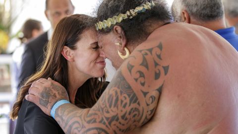 New Zealand Prime Minister Jacinda Ardern (L) hongi (Māori greeting) with a Māori waka paddler as she visits a Waka Camp, Bledisloe Domain on Thursday in Waitangi, New Zealand.