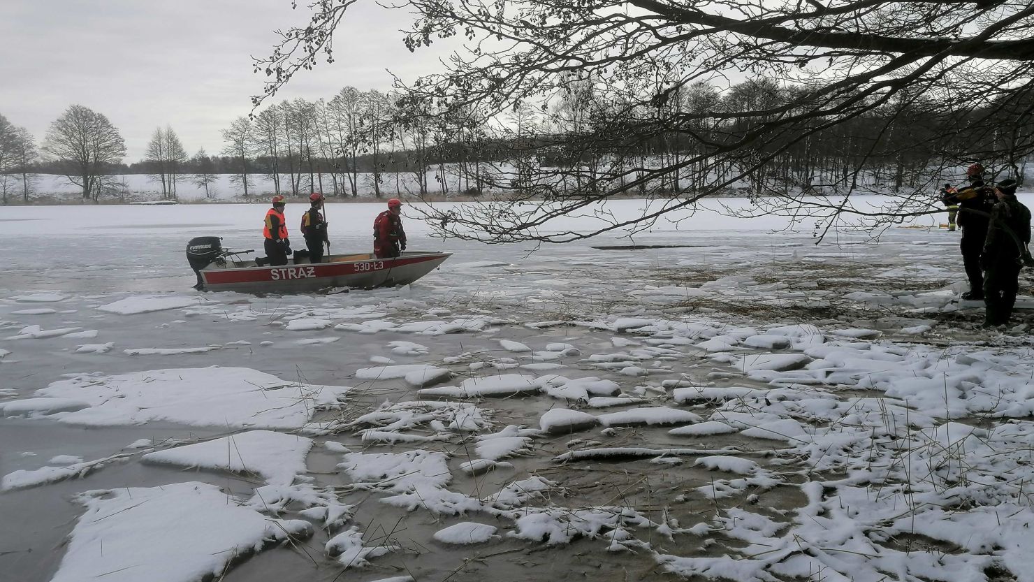 Polish rescuers recover the bodies of a herd of drowned deer after illegal poachers scared the animals with firecrackers.