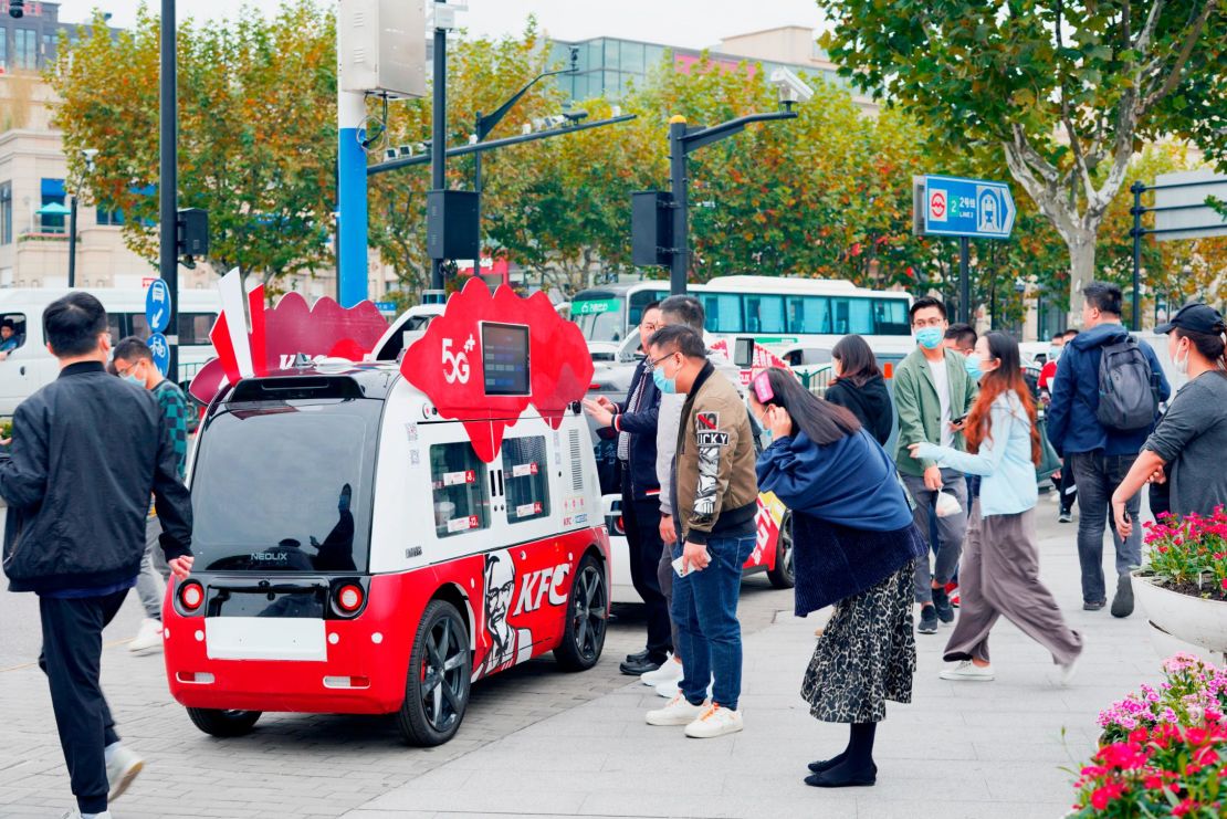 A driverless van deployed by KFC. Last November, the brand piloted a fleet of "dining cars" on the streets of Shanghai.