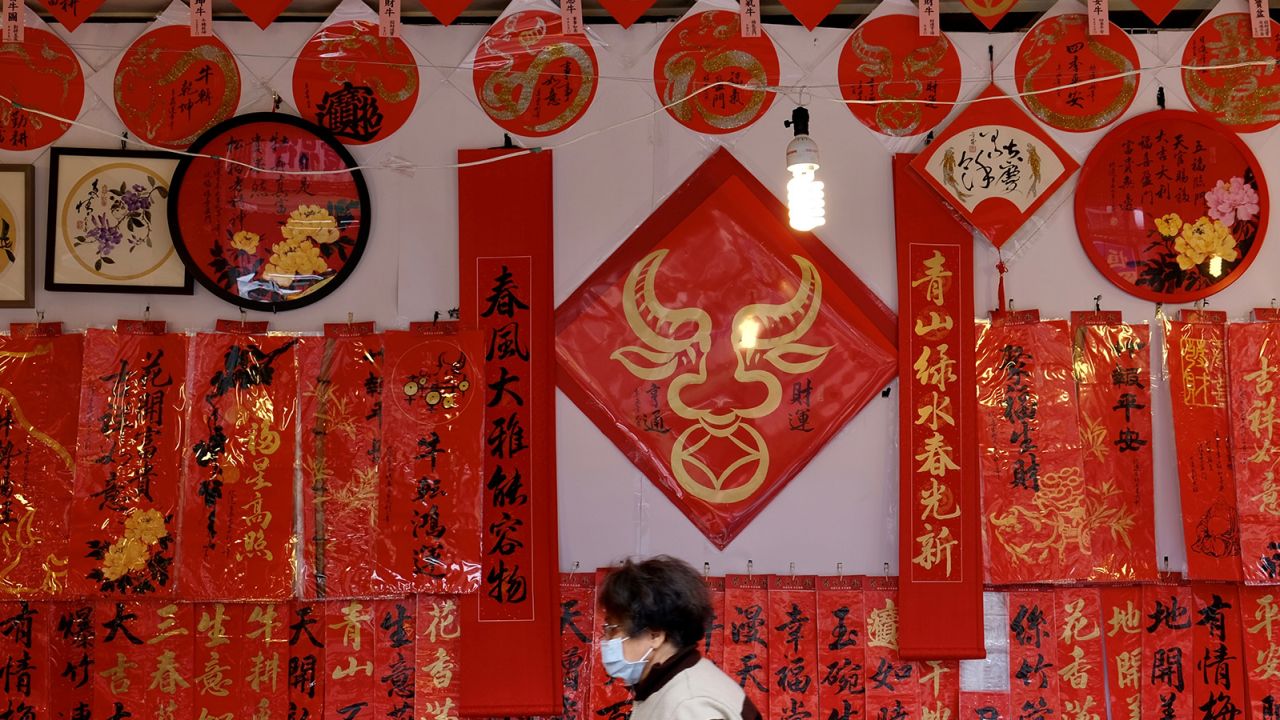 Red banners with auspicious sayings and texts are hung on the 29th day of the last lunar month.