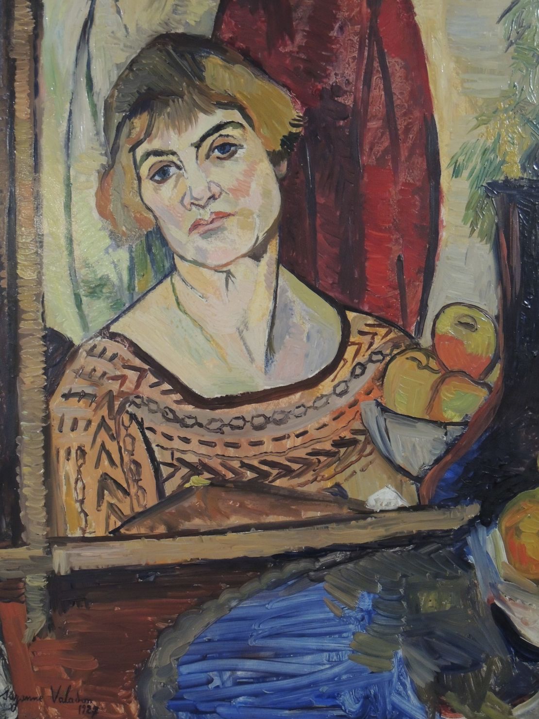 Valadon painted self-portraits as she aged, eschewing idealized views of herself. Pictured: "Self-Portrait," 1927.