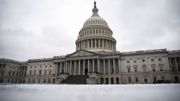 Snow covers the ground on the East Front of the U.S. Capitol in Washington, D.C., on Monday, February 1, 2021. 