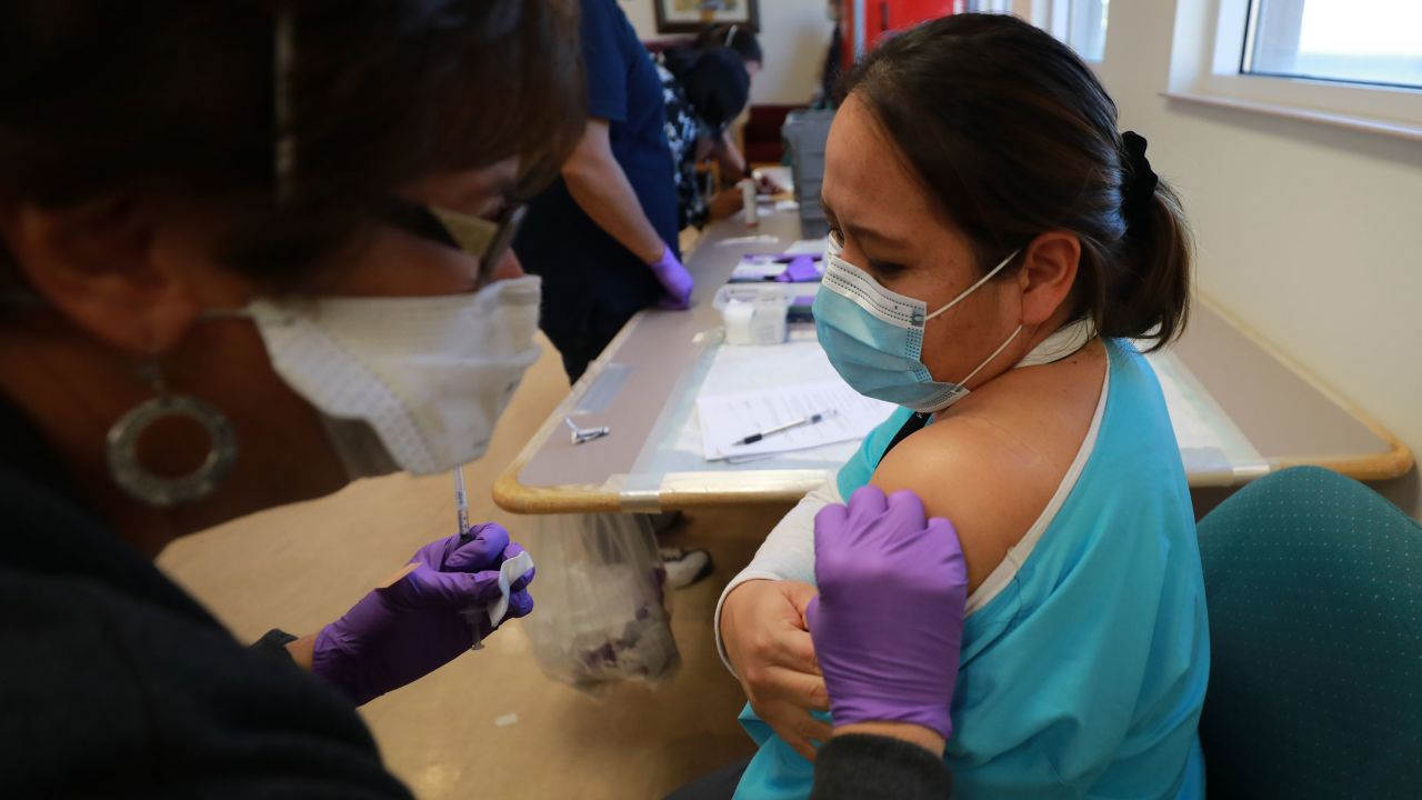 Medical staff at the Northern Navajo Medical Center administering Covid-19 vaccines in Shiprock, New Mexico. The Navajo Nation has a higher vaccination rate than most states.

