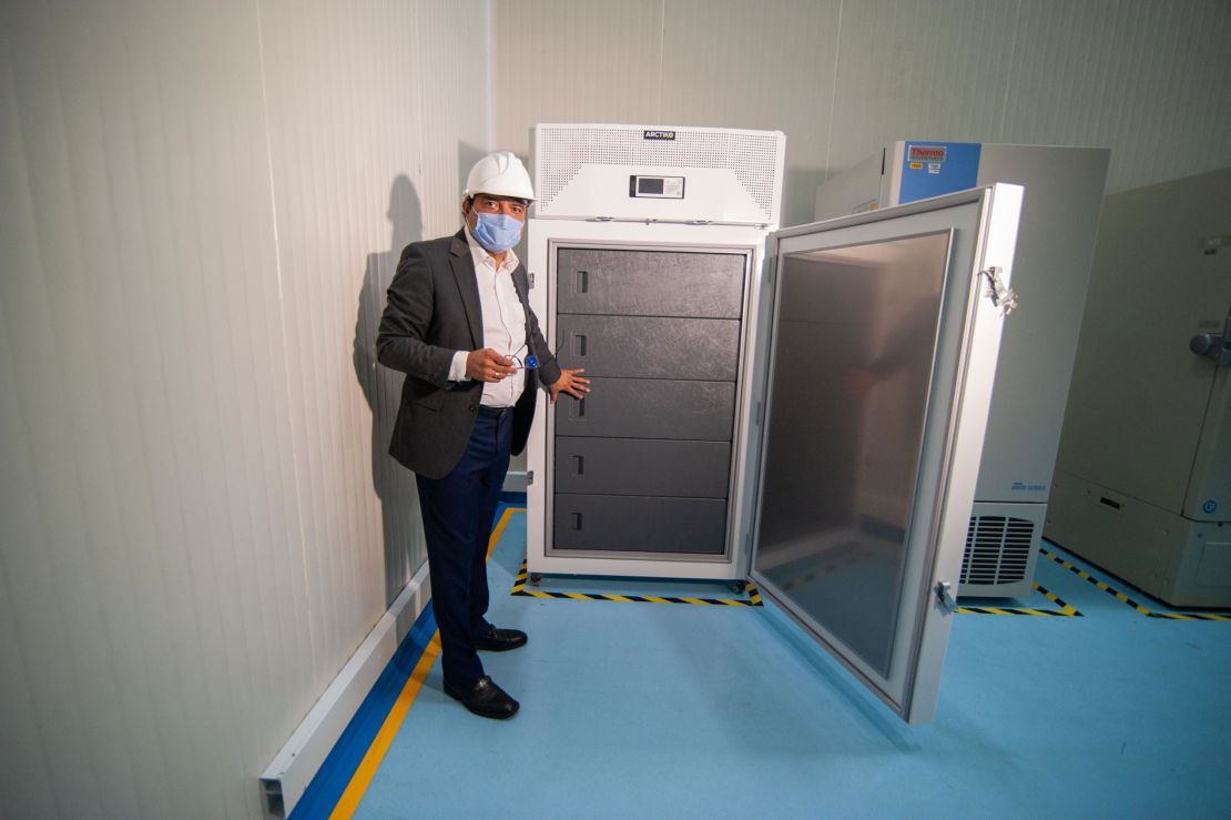 A government official shows an ultracold freezer for housing some COVAX vaccines in Bogota, Colombia on January 19.