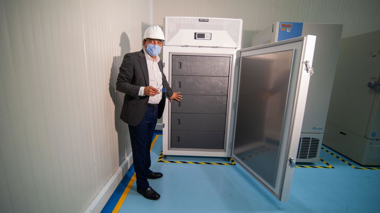 A government official shows an ultracold freezer for housing some COVAX vaccines in Bogota, Colombia on January 19.