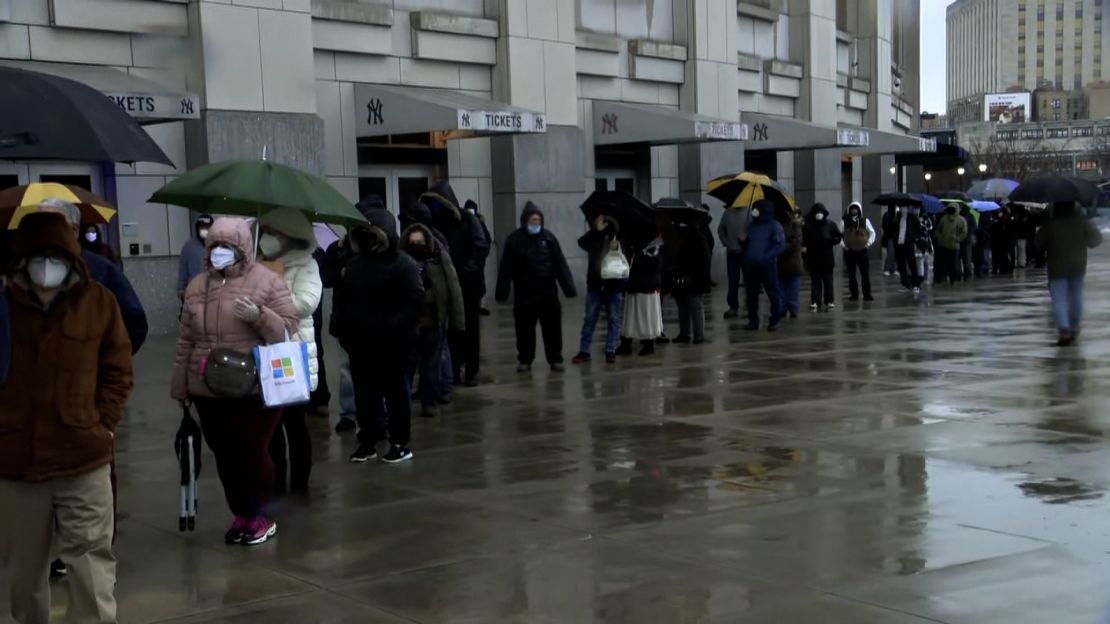 People line up for vaccines at New York's Yankee Stadium on Friday, the day its mass-inoculation site for Bronx residents debuted.