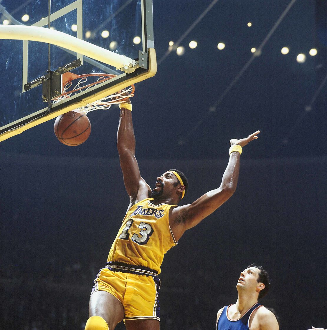 Lakers' Wilt Chamberlain dunking against the New York Knicks in 1970.