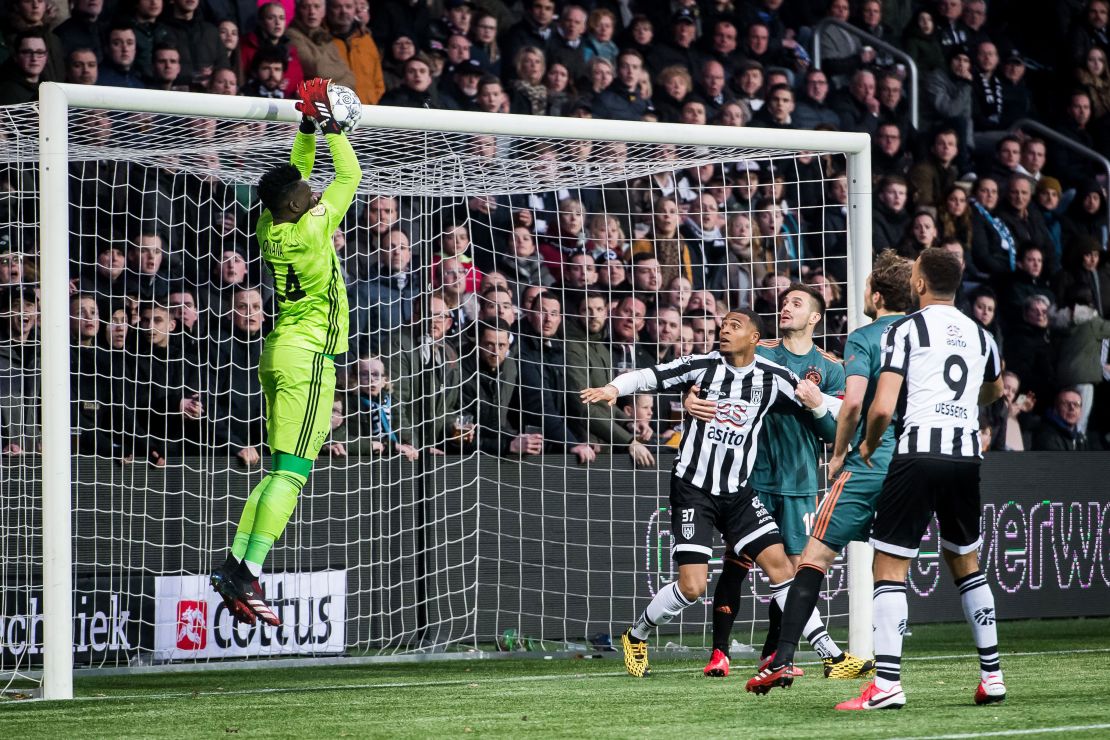 Onana catches the ball durng a match against Heracles Almelo.