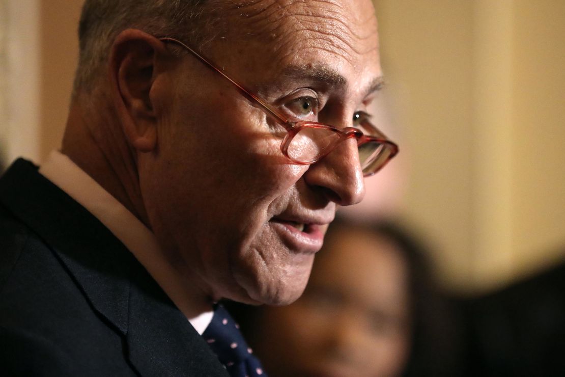 Senate Majority Leader Chuck Schumer talks to reporters in January.