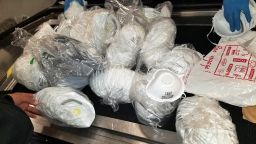 Nearly 59,000 counterfeit COVID masks seized by officials