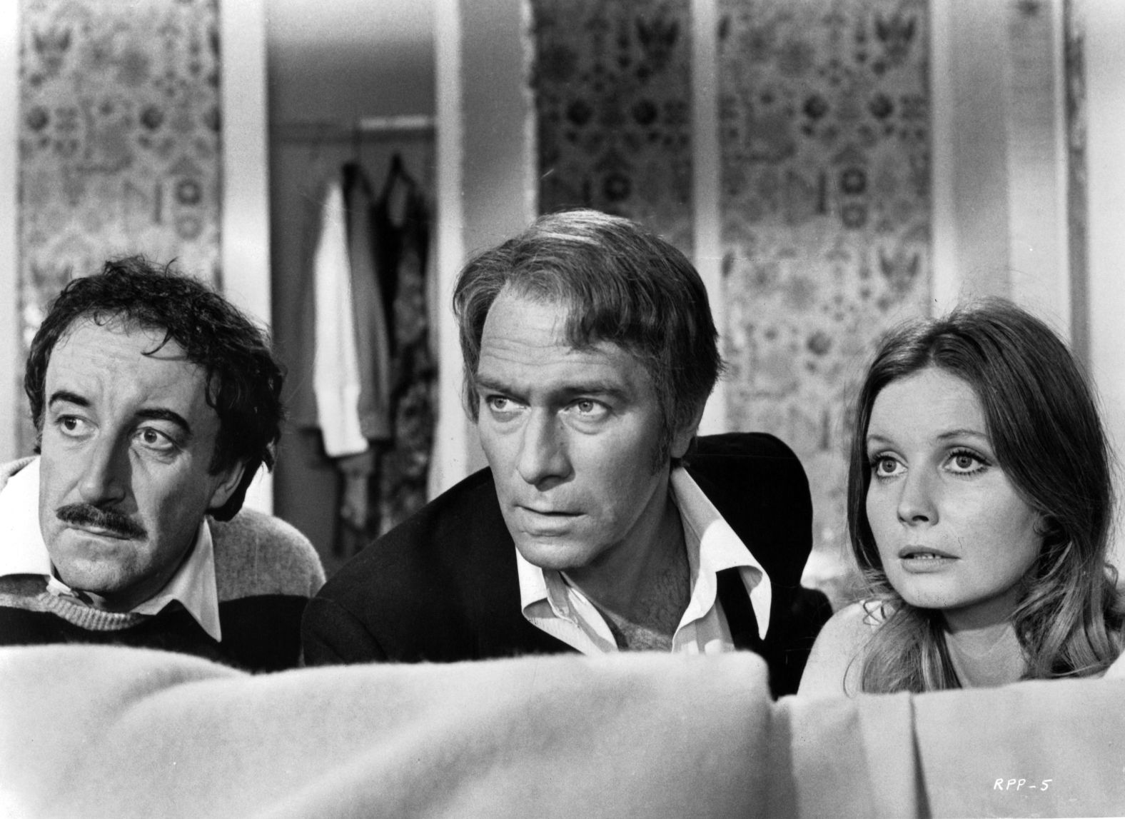 From left, Peter Sellers, Plummer and Catherine Schell appear in the 1975 film "The Return of the Pink Panther."