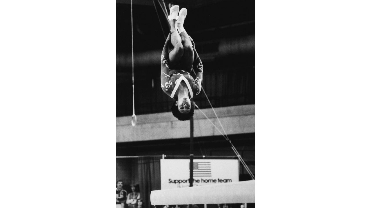 Durham does a flip during individual final competition of the balance beam at the 1983 USA national gymnastic championship.