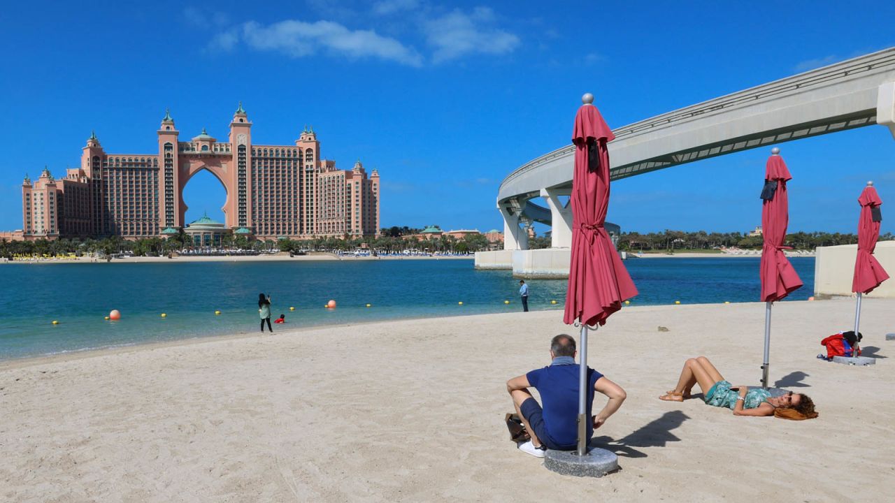 Dubai is facing tighter restrictions after a spike in Covid-19 cases. That's Atlantis the Palm in the background.