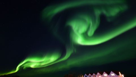 The aurora borealis lights up the night sky in Iceland.