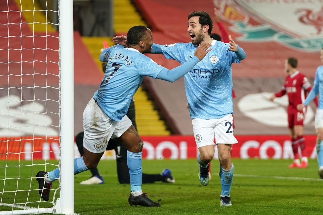 Sterling celebrates with Silva after scoring City's third goal.
