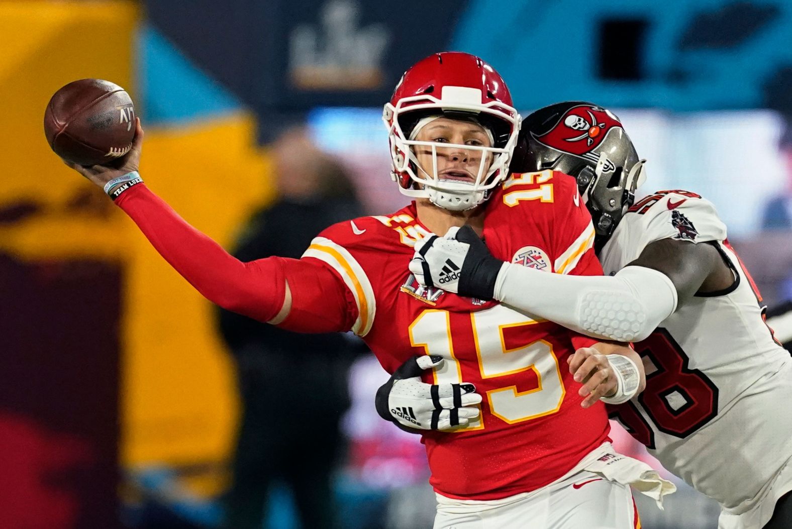 Mahomes is pressured by Shaquil Barrett early in the game. Mahomes had only 9 passing yards in the first quarter.