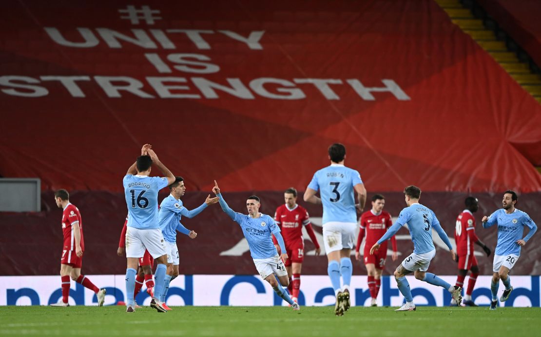 Foden celebrates after scoring Manchester City's fourth goal against Liverpool.