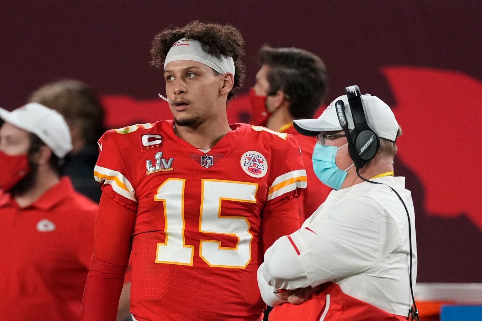 Mahomes watches from the sideline late in the second half.