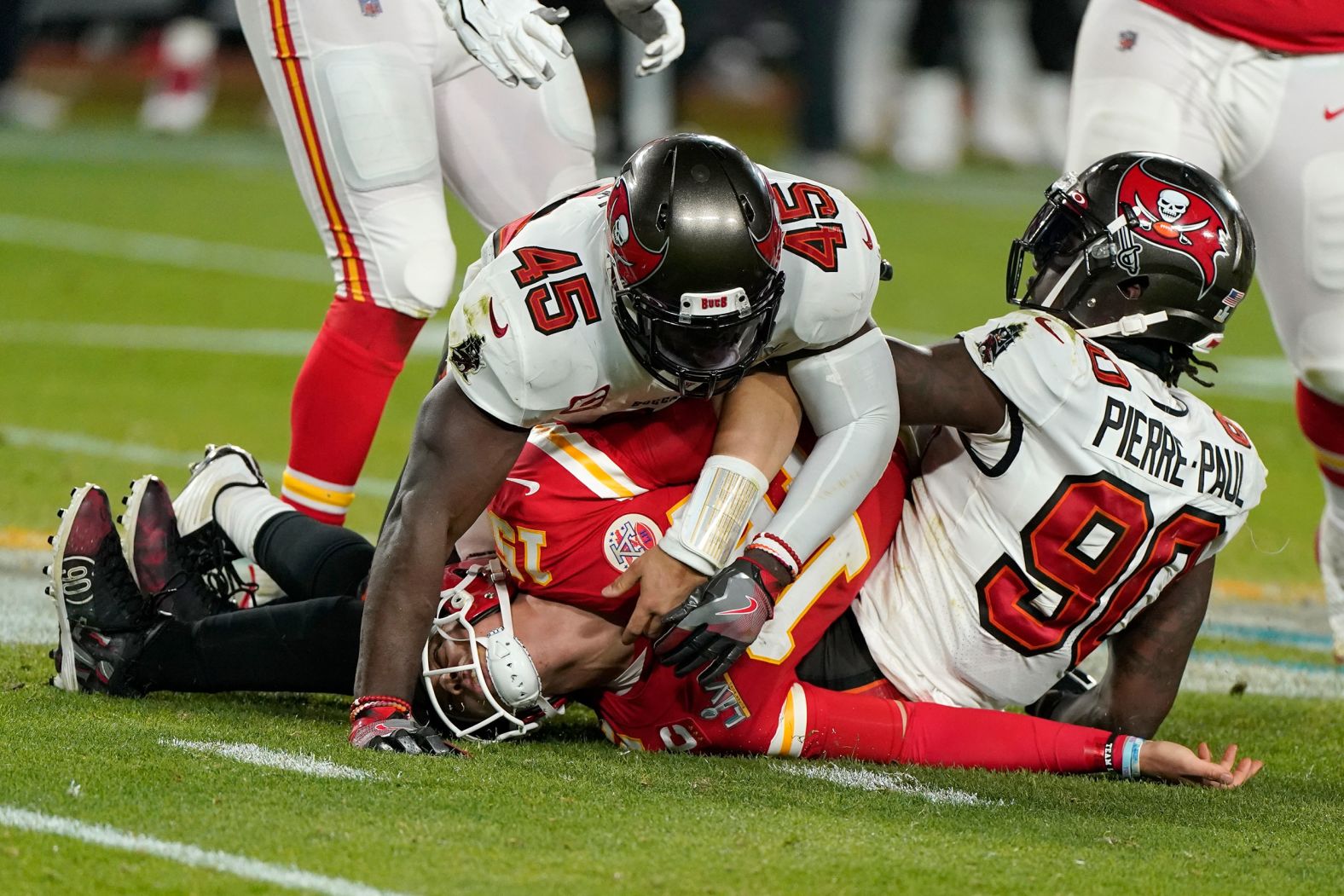 Mahomes is crunched by White and Jason Pierre-Paul in the second half.