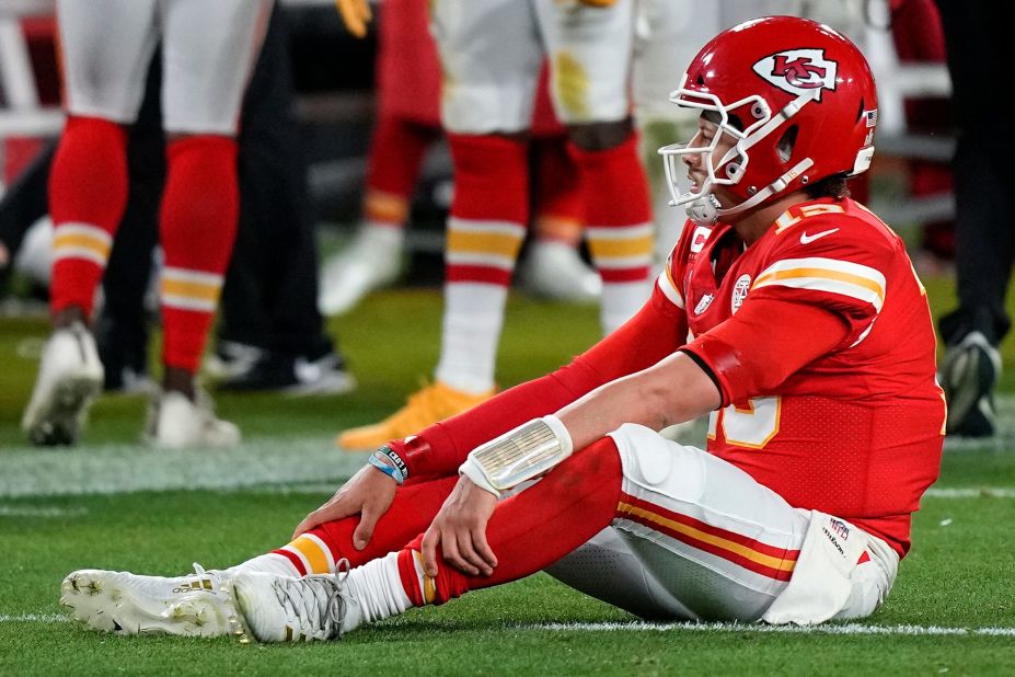Mahomes sits on the turf during the second half. It was a rough game for last year's Super Bowl MVP, who was under heavy pressure all night.