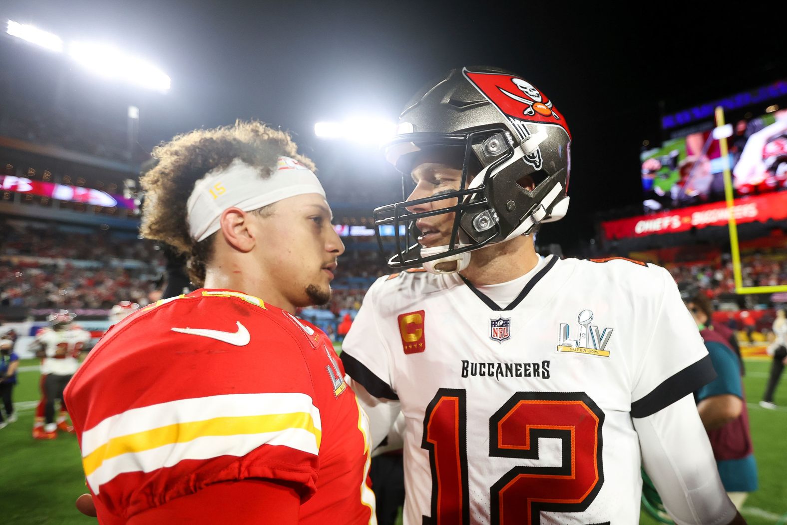 Brady and Kansas City quarterback Patrick Mahomes meet after the game.
