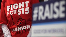 An activist wears a "Fight For $15" T-shirt during a news conference prior to a vote on the Raise the Wage Act July 18, 2019 at the U.S. Capitol in Washington, DC. 